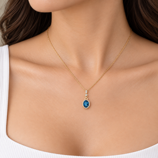 Emilia 10K Yellow Gold Oval-Cut Brazilian London Blue Topaz Pendant