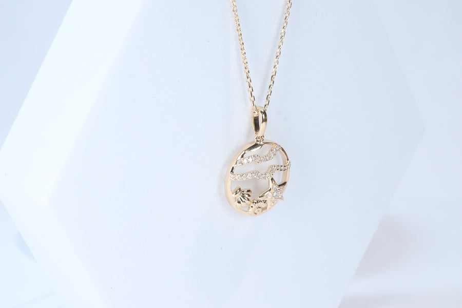 Smithsonian Museum collection by G&G features a serene under water life Pendant in 14K Yellow gold and Diamond for exclusive everyday look